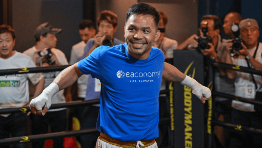 Retired boxing superstar Manny Pacquiao poses for photographers at a recent event in file photo. Pacquiao to come out of retirement, eyes Barrios' title: reports