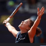 Italy's Jasmine Paolini raises her arms in celebration after her semifinals match against Peyton Stearns in Rome on Thursday. Paolini reaches Italian Open final vs Gauff; Sinner, Musetti in semis