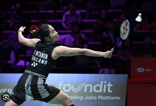 Thailand's Ratchanok Intanon reaches to hit a shot in file photo. Karunakaran upsets Tien Chen in Malaysia Masters; Srikanth wins