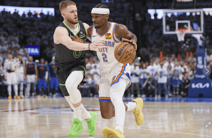 OKC guard Shai Gilgeous Alrexander (right) drives against Minnesota guard Donte Divincenzo (left) in Game 1 of their Western Conference Finals on Tuesday. Thunder vs Timberwolves sees OKC take Game 1 with big win