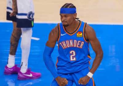OKC guard Shai Gilgeous Alexander flexes his muscles in Game 2 of their Western Conference Finals series against the Minnesota Timberwolves on Thursday. OKC vs Wolves Game 2 sees Thunder take 2-0 lead behind SGA