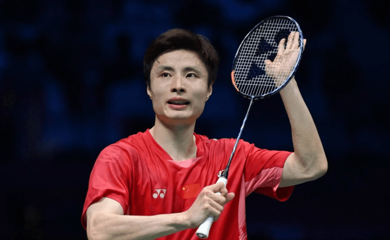 China's Shi Yu Qi taps his racquet during a lull in his Sudirman Cup final match against South Korea in Xiamen on Sunday. China dominates South Korea to win 4th Sudirman Cup title