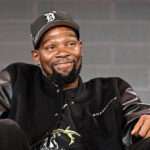 All-Star forward Kevin Durant smiles as he fields questions at an interview in file photo. Durant to join Rockets in blockbuster trade; Suns get Green