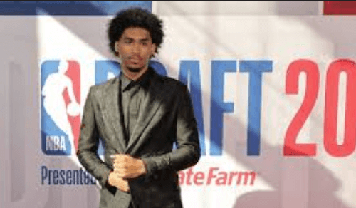 Rutgers guard Dylan Harper poses for photographers after he was picked No.2 overall by the San Antonio Spurs at the 2025 NBA Draft on Wednesday. 2025 NBA Draft sees Flagg go No.1 at Dallas; Harper to Spurs