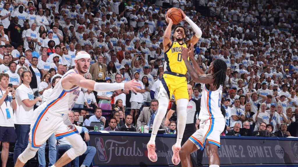 Indiana guard Tyrese Haliburton (0, middle) pulls up for the game-winner that lifted the Pacers over the OKC Thunder in Game 1 of the NBA Finals 2025 on Thursday. Indiana vs OKC series sees Pacers steal Game 1 in NBA Finals