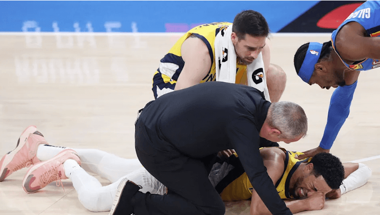 Indiana guard Tyrese Haliburton (on floor) goes down in pain due to a right lower leg injury in the first quarter of Game 7 of the NBA Finals against the OKC Thunder on Sunday. Thunder vs Pacers Game 7 sees OKC gets title; Haliburton exits