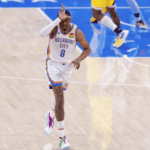 OKC forward Jalen Williams flashes a sign while waking on the court after taking a shot in Game 5 of the NBA Finals on Tuesday. NBA Finals Game 6 sees OKC seek title; can Haliburton return?