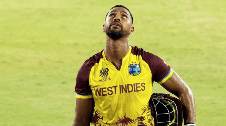 Top cricketer Nicholas Pooran looks up at the scoreboard while playing for West Indies in file photo. Pooran retires from intl cricket, West Indies national team at 29