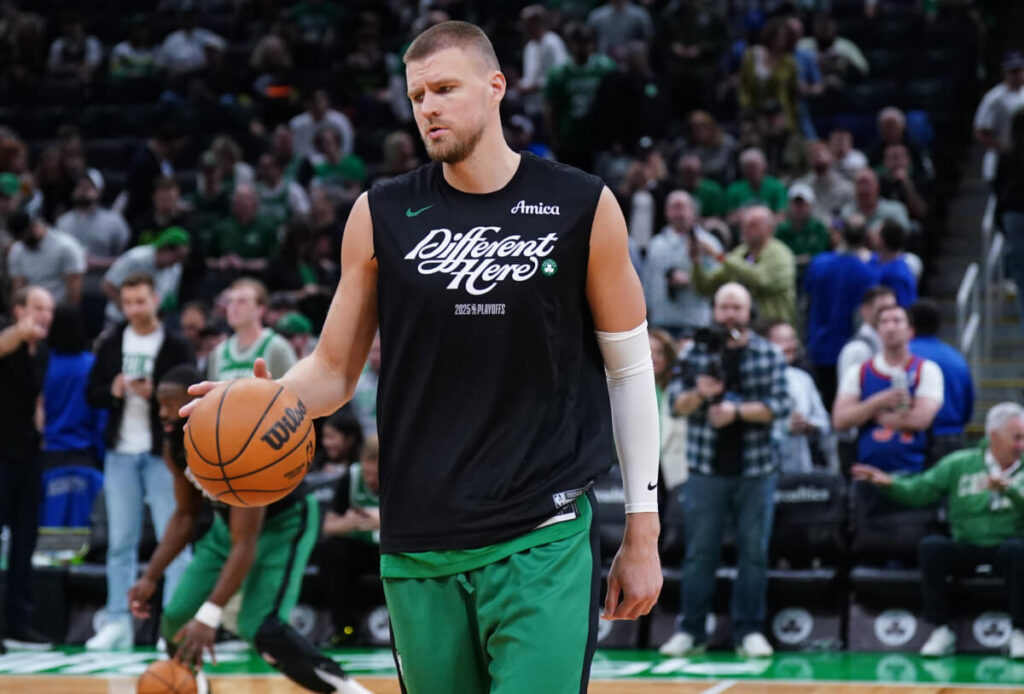Latvian big man Kristaps Porzingis dribbles while doing warmups while playing for the Boston Celtics in file photo. Porzingis trade not Boston’s ‘last domino’ as Draft nears: expert