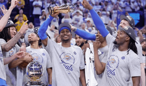 OKC playmaker Shai Gilgeous Alexander (2, middle) holds the Western Conference finals MVP trophy as the Thunder won the West finals in file photo. Indiana vs OKC sees Paul George trades as links to both teams  
