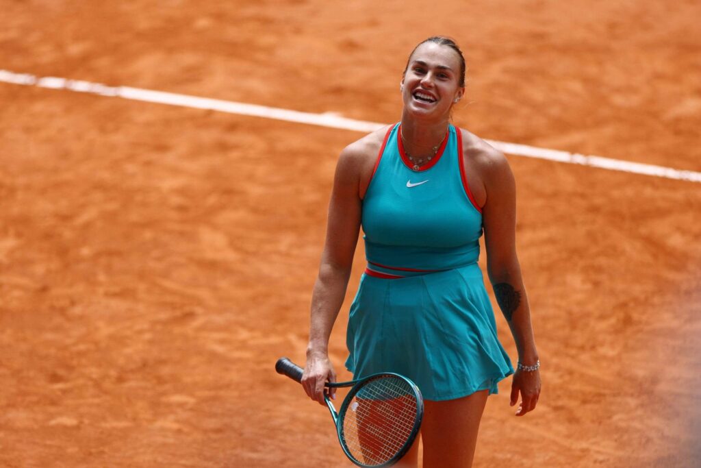 Belarus' Aryna Sabalenka smiles to the crowd in her French Open quarterfinal vs China's Zheng QInwen on Tuesday. Alcaraz reaches French Open semis; Swiatek, Sabalenka in last 4